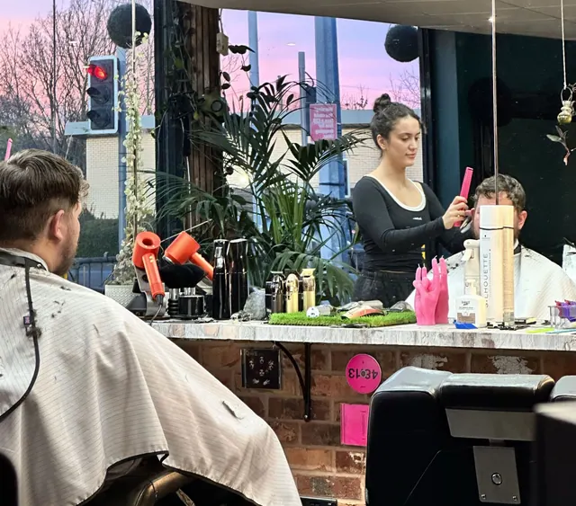 A cut in progress at Ether Cut, with the plants and mirrors behind